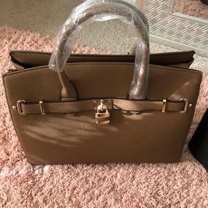 Brand new purse and wristlet combo.